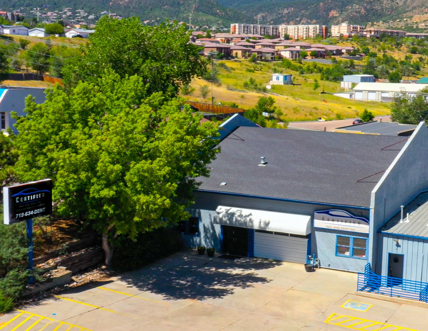 Certified Hail and Dent shop and parking lot at 1394 South 21st Street in Colorado Springs