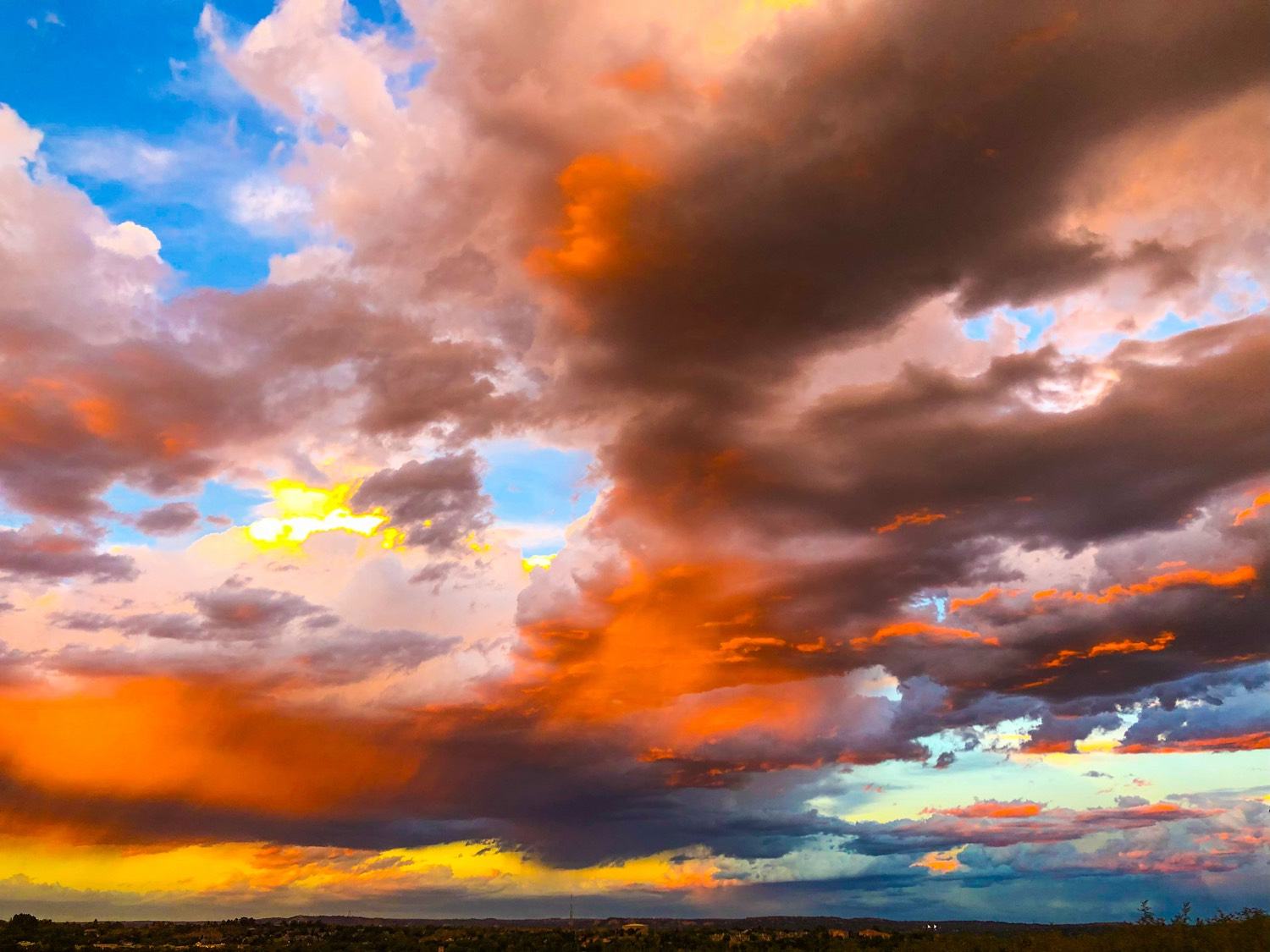 Colorado Springs hail storm clouds at sunset after severe weather