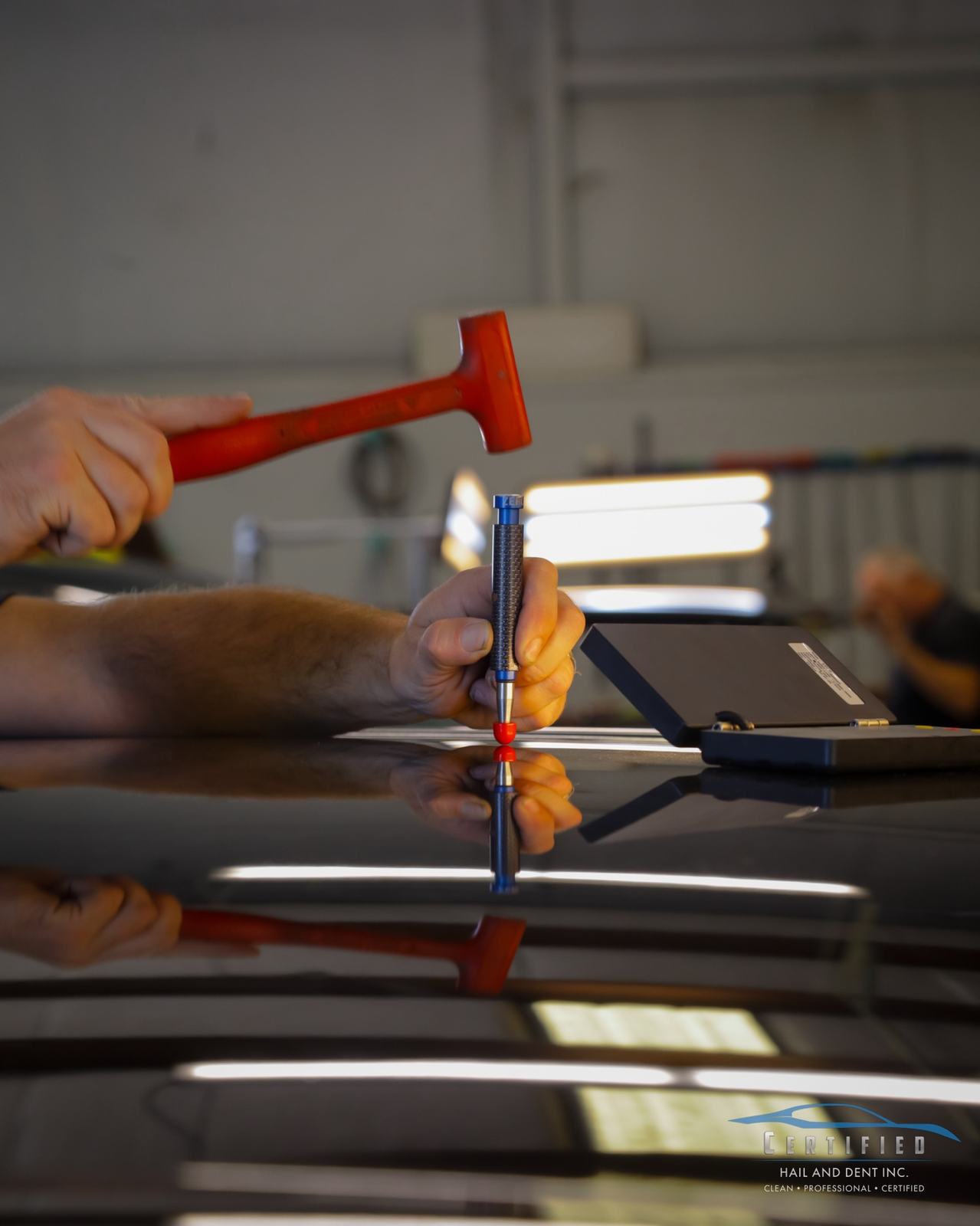Paintless dent repair knockdown hammer and tools used for hail damage Colorado Springs